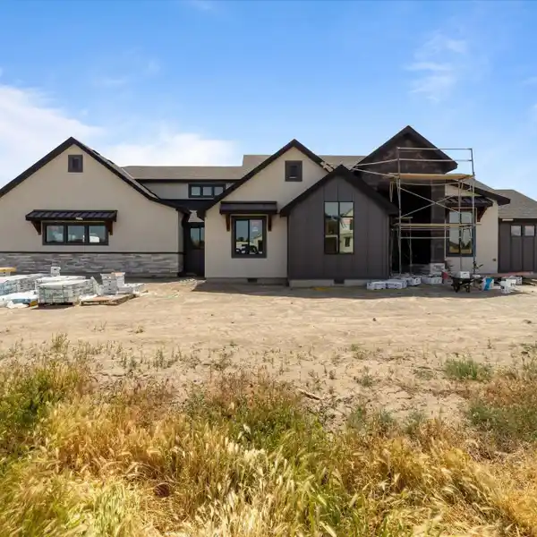EXQUISITE NEW CUSTOM HOME WITH PANORAMIC VIEWS