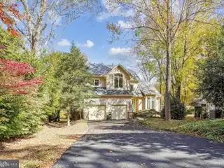Sunlit Retreat Overlooking Butler Pond