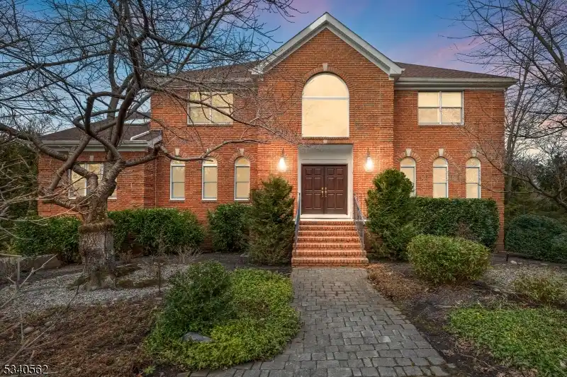 Elegant Brick-front Colonial in Sought-after Running Brook