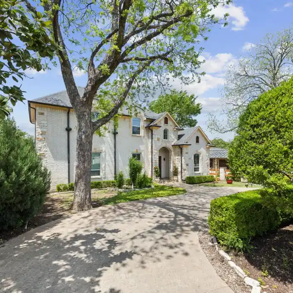 THOUGHTFULLY DESIGNED HOME IN DESIRABLE BRIARWOOD