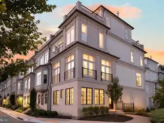 Sunlit End-Unit Retreat with Dual Roof Terraces