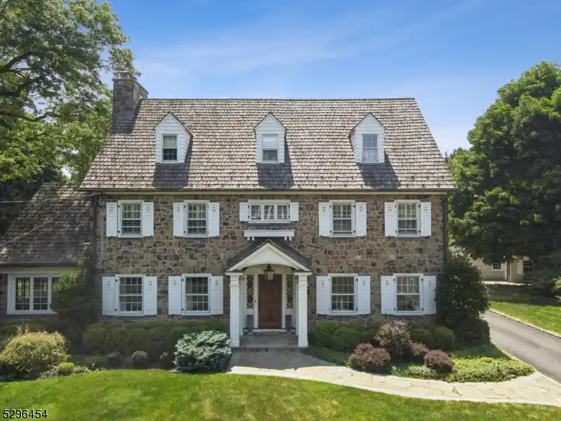 Spectacular Estate with Level Acreage