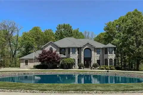 Exceptional Residence on over Five Wooded Acres