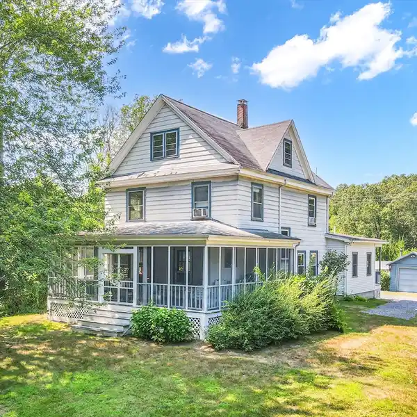 COLONIAL-STYLE FARMHOUSE OFFERING A UNIQUE OPPORTUNITY
