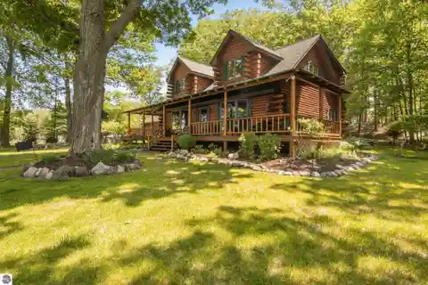 Beautifully Maintained Lakefront Log Home
