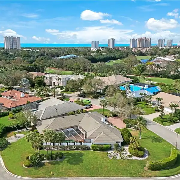 GREAT POTENTIAL IN PELICAN BAY WOODS