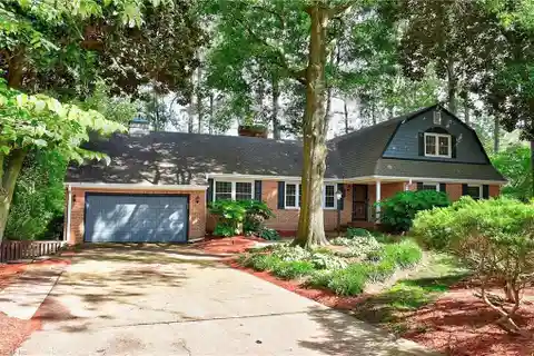 All-Brick Home on a Serene Waterfront Lot