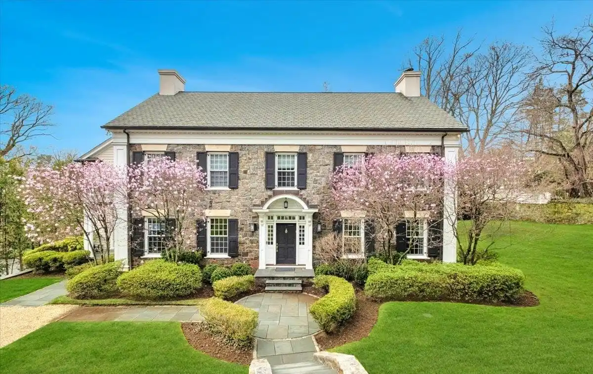 Exquisite Stone Center Hall Colonial
