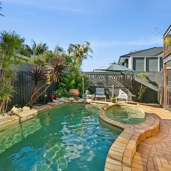 ARCHITECTURALLY COMPELLING HOME IN A SERENE SETTING