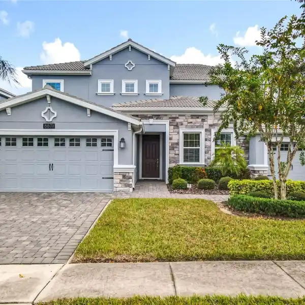 BEAUTIFULLY UPGRADED POOL HOME IN CHAMPIONS GATE