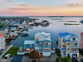 Unmatched Waterfront Living on Desirable Rainbow Row
