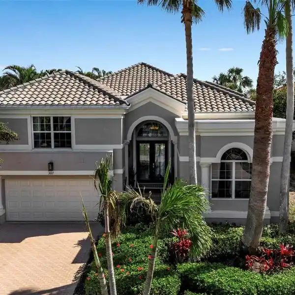 THE ULTIMATE FLORIDA LIFESTYLE IN THE EXCLUSIVE QUEENS HARBOUR OF BAY ISLES
