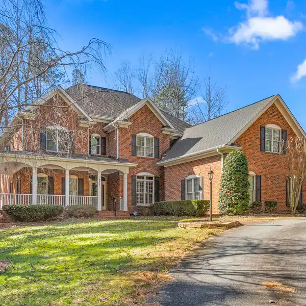 CUSTOM ONE-OWNER BRICK HOME ON 13-PLUS ACRES