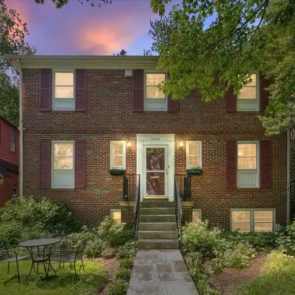 CHARMING COLONIAL-STYLE BRICK HOME