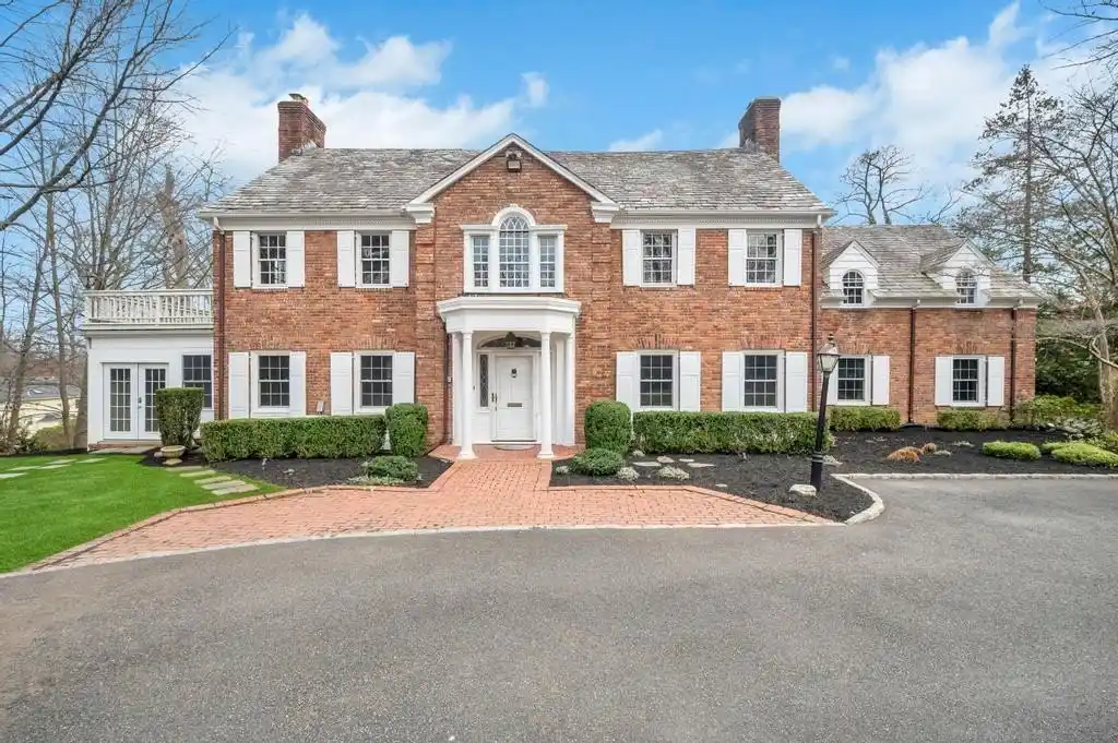 Gracious and Grand Brick Center Hall Colonial