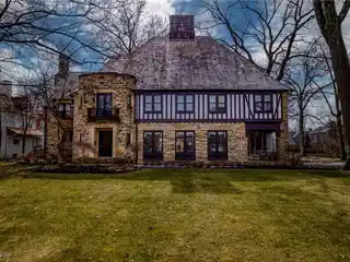 Prominent Stone and Brick English Country Home