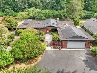 Riverfront Mid-century Gem with Timeless Style