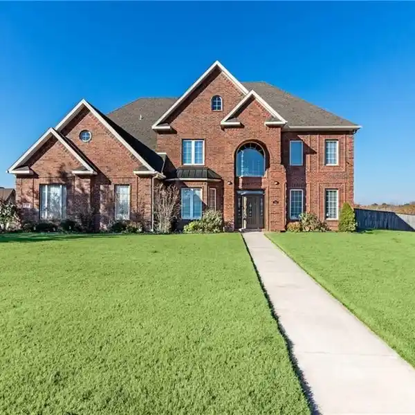 CUSTOM BUILT BRICK HOME ON A SCENIC ACRE