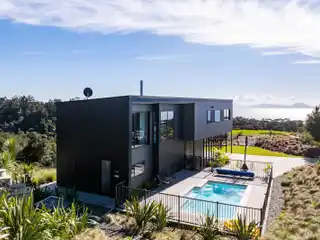 Modern Coastal Retreat Amid Native Bush