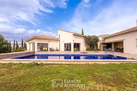 Mediterranean Elegance in a Serene Green Setting