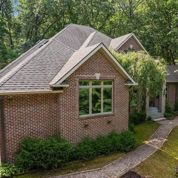 QUALITY TRADITIONAL HOME ON FIVE SECLUDED ACRES