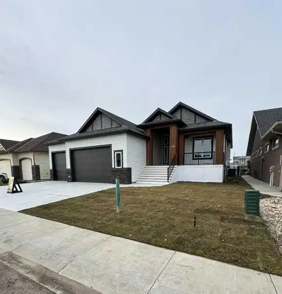 EXCEPTIONAL NEW HOME IN COVETED HARRISON GREEN