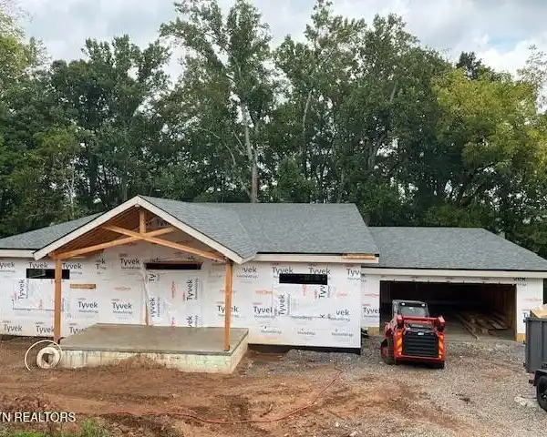 ENERGY-EFFICIENT HOME BACKING TO NATURAL SPRING