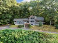 PRIVATE FIVE-BEDROOM HOME ON A 35-ACRE FARM