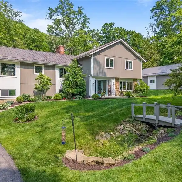 CUSTOM HOME ON THREE BEAUTIFUL ACRES