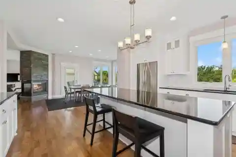 Immaculate Enclave Home with Expansive Living Space