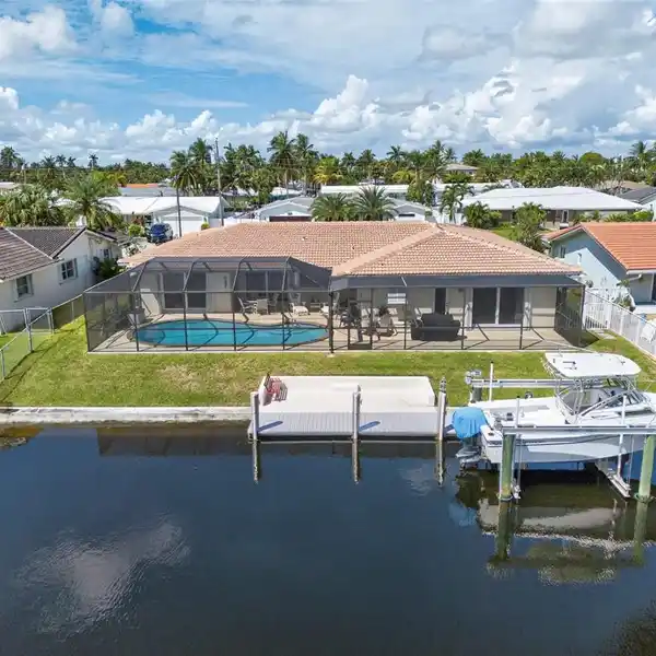 WELL-MAINTAINED WATERFRONT POOL HOME