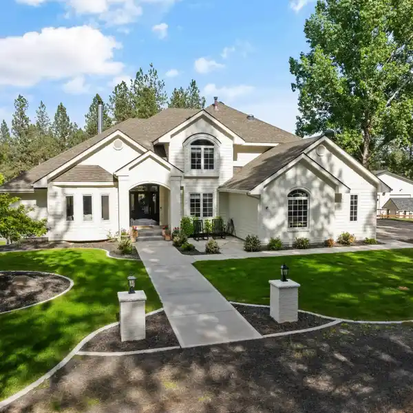 EXCEPTIONAL HOME ON FIVE WOODED ACRES