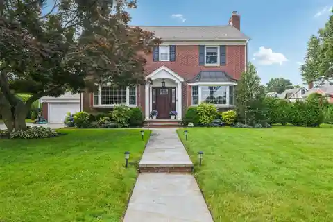 Beautifully Updated and Expanded Brick Colonial