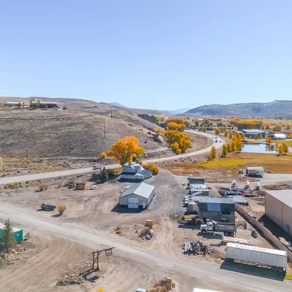 TURNKEY PROPERTY WITH RENOVATED RESIDENCE AND EXPANSIVE SHOP SPACE