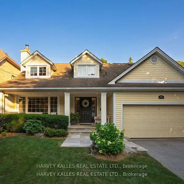 STUNNING HOME SET ON COVETED AND TRANQUIL TREE-LINED STREET IN HUMBER VALLEY VILLAGE
