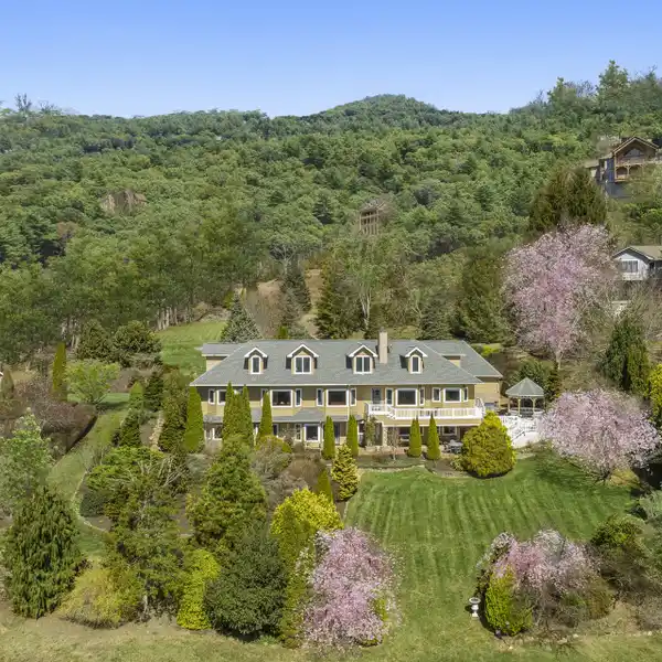 EXQUISITE ENGLISH-STYLE COUNTRY ESTATE OVERLOOKING LAUREL RIDGE COUNTRY CLUB