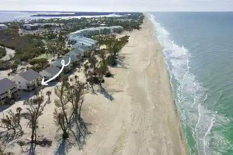 Exquisite Completely Renovated Turnkey Condo Steps to the Sand