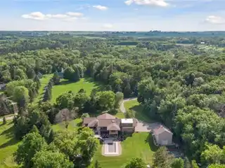 Mid-Century Modern Oasis on 5+ Wooded Acres