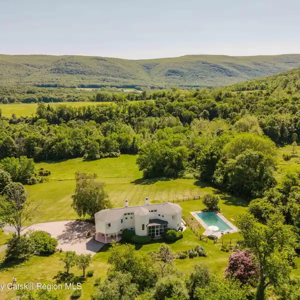 PRIVATE 24-ACRE CONTEMPORARY ESTATE WITH HEATED POOL