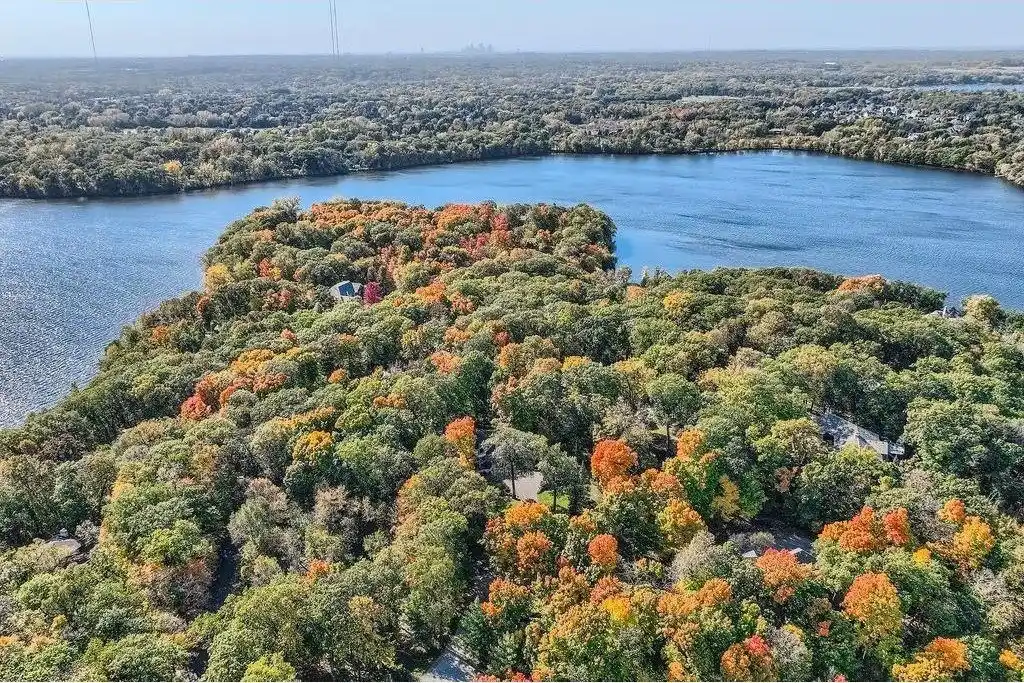 Custom Home on a Private Wooded Lot on the Island of Pleasant Lake