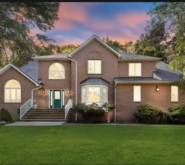 EXCEPTIONAL CENTRAL HALL COLONIAL HOME