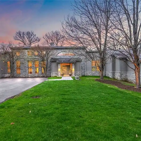 SPECTACULAR ESTATE ON 10-PLUS WOODED ACRES