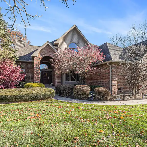 GRAND HOME WITH ELEGANT UPGRADES AND PRIVATE BACKYARD