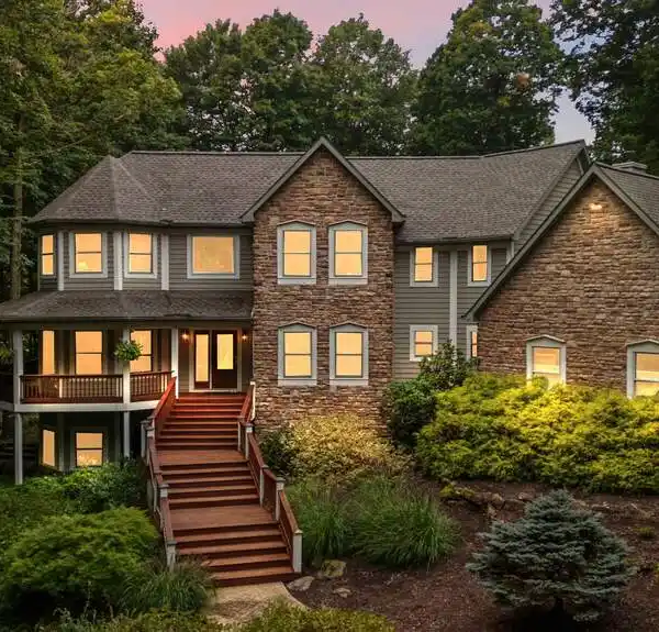 REFINED LIVING ON SIX WOODED ACRES