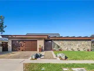 Grand Coastal Retreat with Airy Design