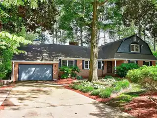 All-Brick Home on a Serene Waterfront Lot