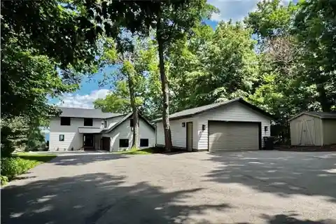 Gull Lake Luxury with 150’ Sandy Shoreline