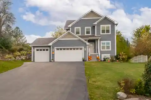 Charming Two-Story Home with Ample Storage