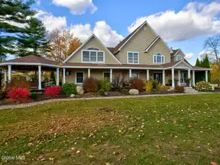 Premier 60-Acre Equestrian Estate with Luxury Farmhouse