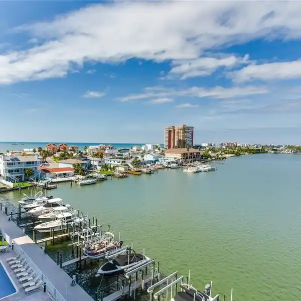 WATERFRONT LUXURY CORNER CONDO WITH PANORAMIC GULF VIEWS